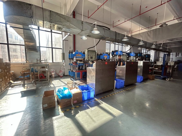 Production workshop with molding presses